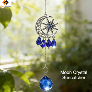 Moon Crystal Suncatcher hanging in a sunlit window, showcasing blue crystal prisms and evil’s eye design for wholesale retail
