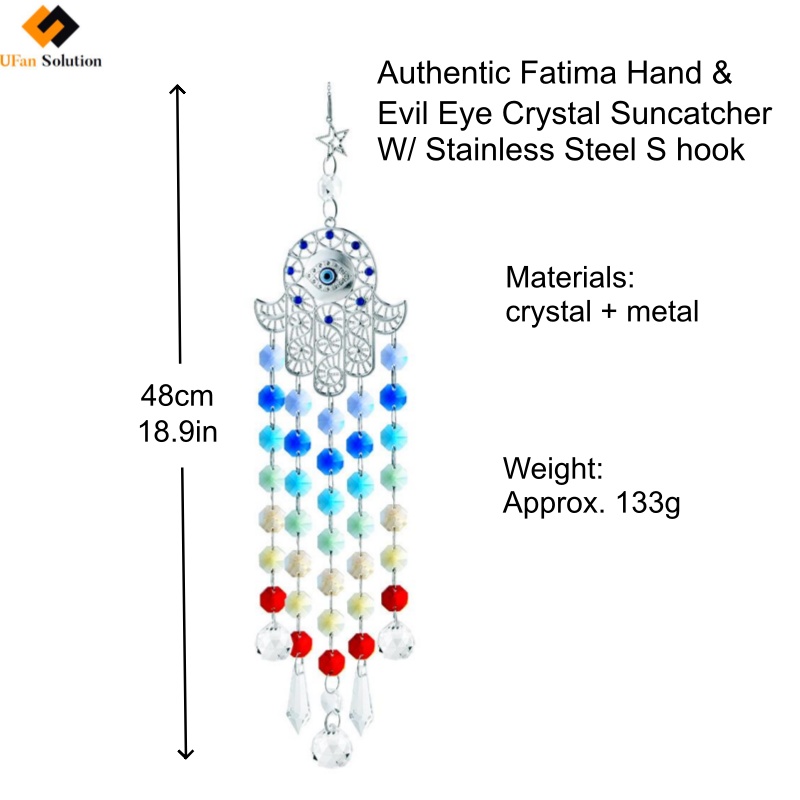 Close-up of crystal sun catchers beads reflecting rainbow light