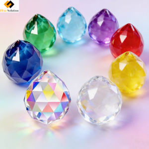 Suncatcher Crystal Prism hanging in a window, casting rainbow prisms into the room.