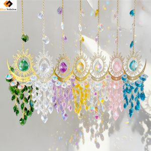 Colorful Crystal Moon Suncatcher hanging in a row, casting rainbow prisms on the wall