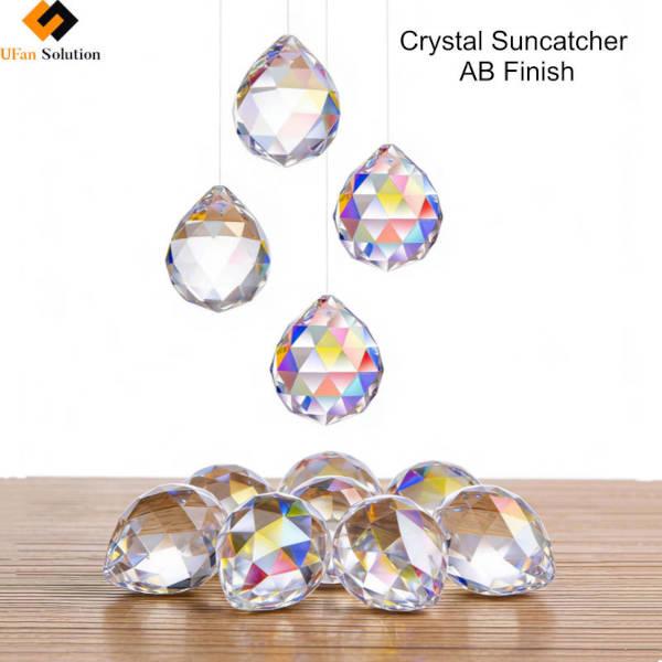 AB Rainbow Crystal Beads (Suncatcher) Hanging and Arranged on Wooden Surface