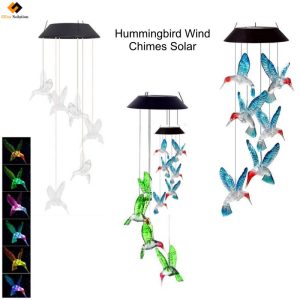 Comparison of brightly lit solar hummingbird wind chimes with blue, green, and clear against light of chimes.