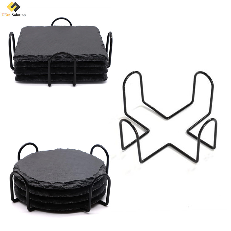 Black iron wire coaster holder holding four round coasters, showcasing its durable metal construction and 4-inch diameter compatibility.