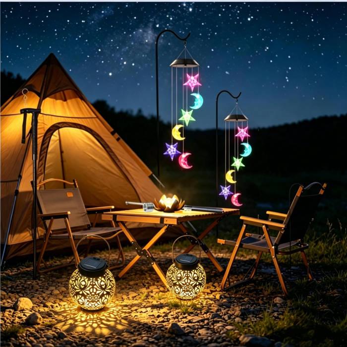 A warm, inviting campsite at night with an orange tent, wooden furniture, and glowing star-shaped solar lights, showcasing the potential of Cheap camping gear wholesale.